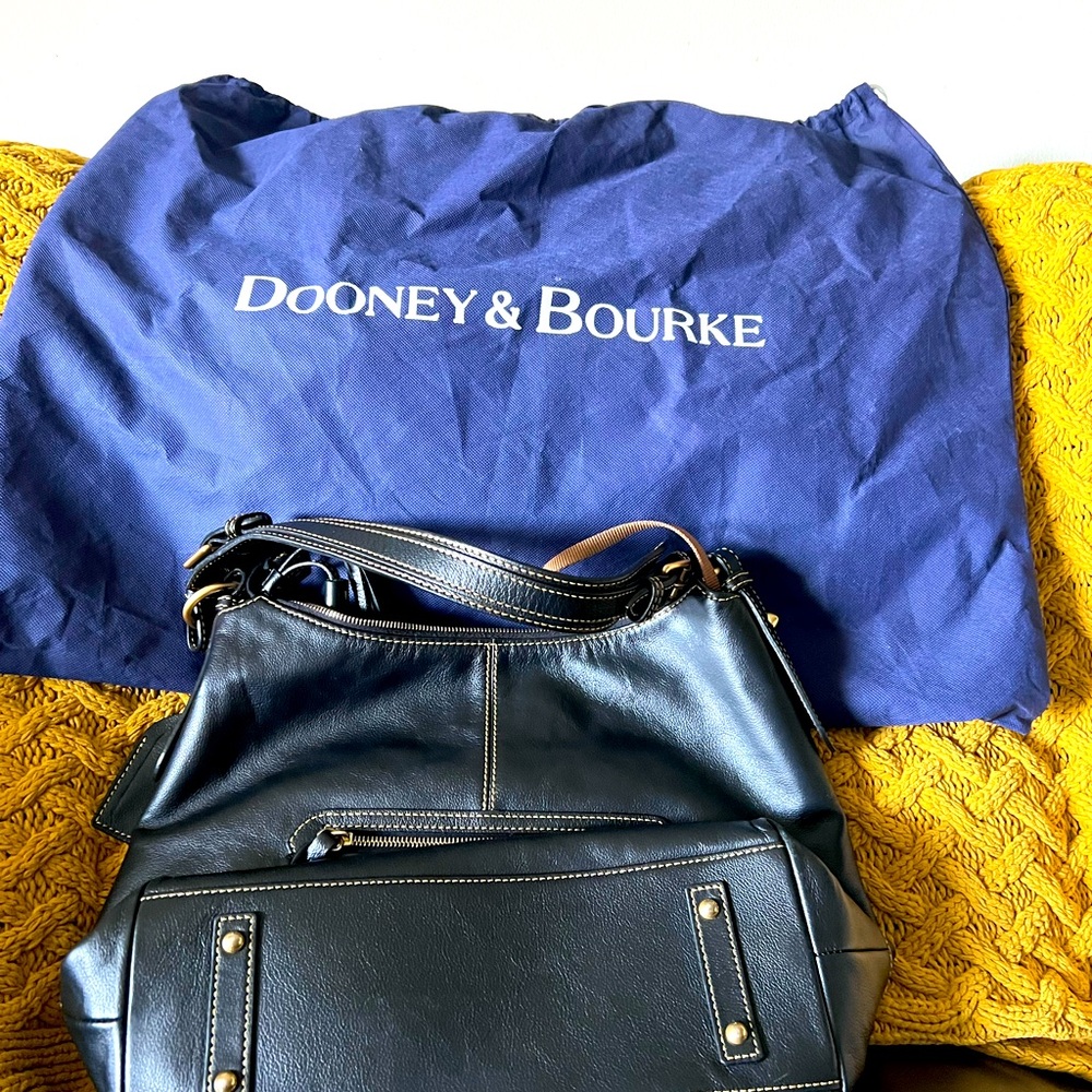 Dooney $ Bourke Black leather purse and storage bag